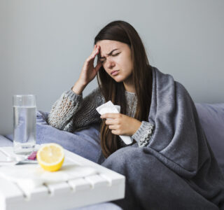 woman-on-couch-with-medication-scaled